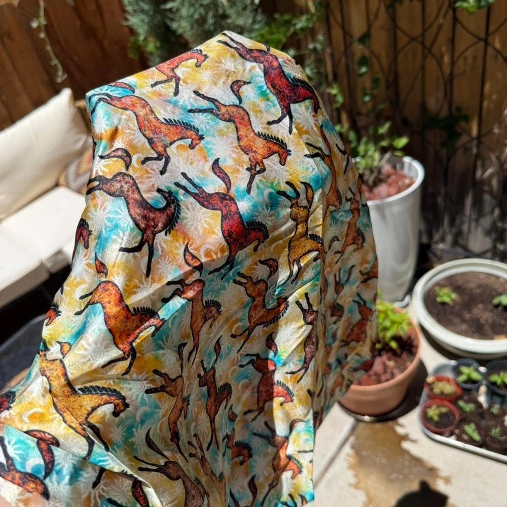 Southwestern silk scarf with horse and sun designs